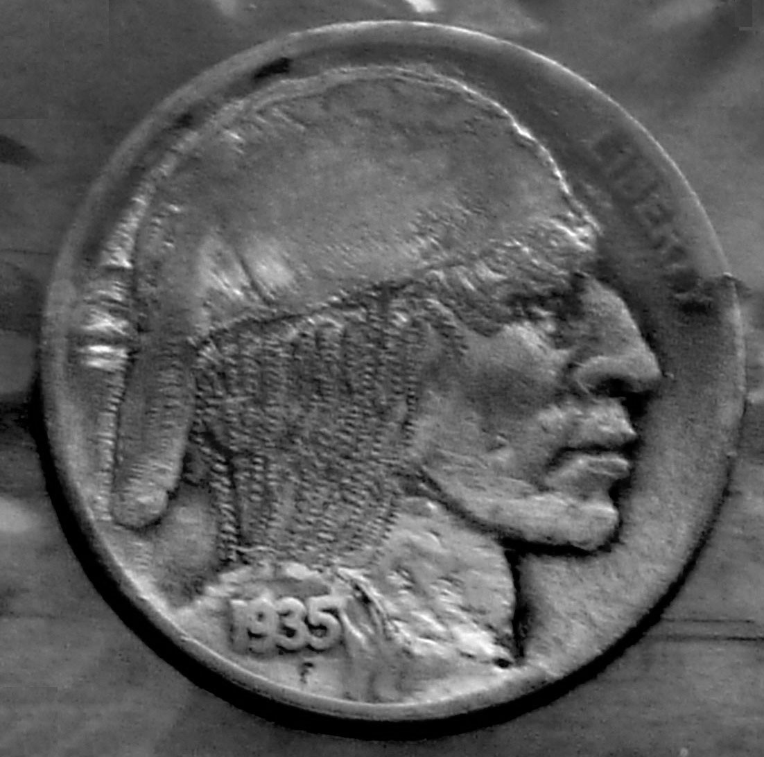 Carved hobo nickel with ball cap