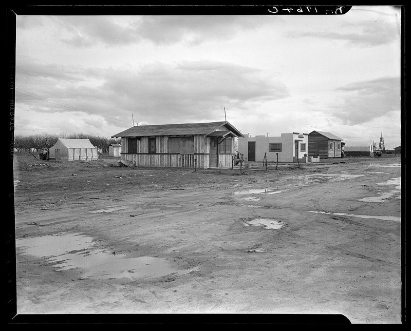 Street and homes in Little Oklahoma; tents, shacks, freight cars as homes