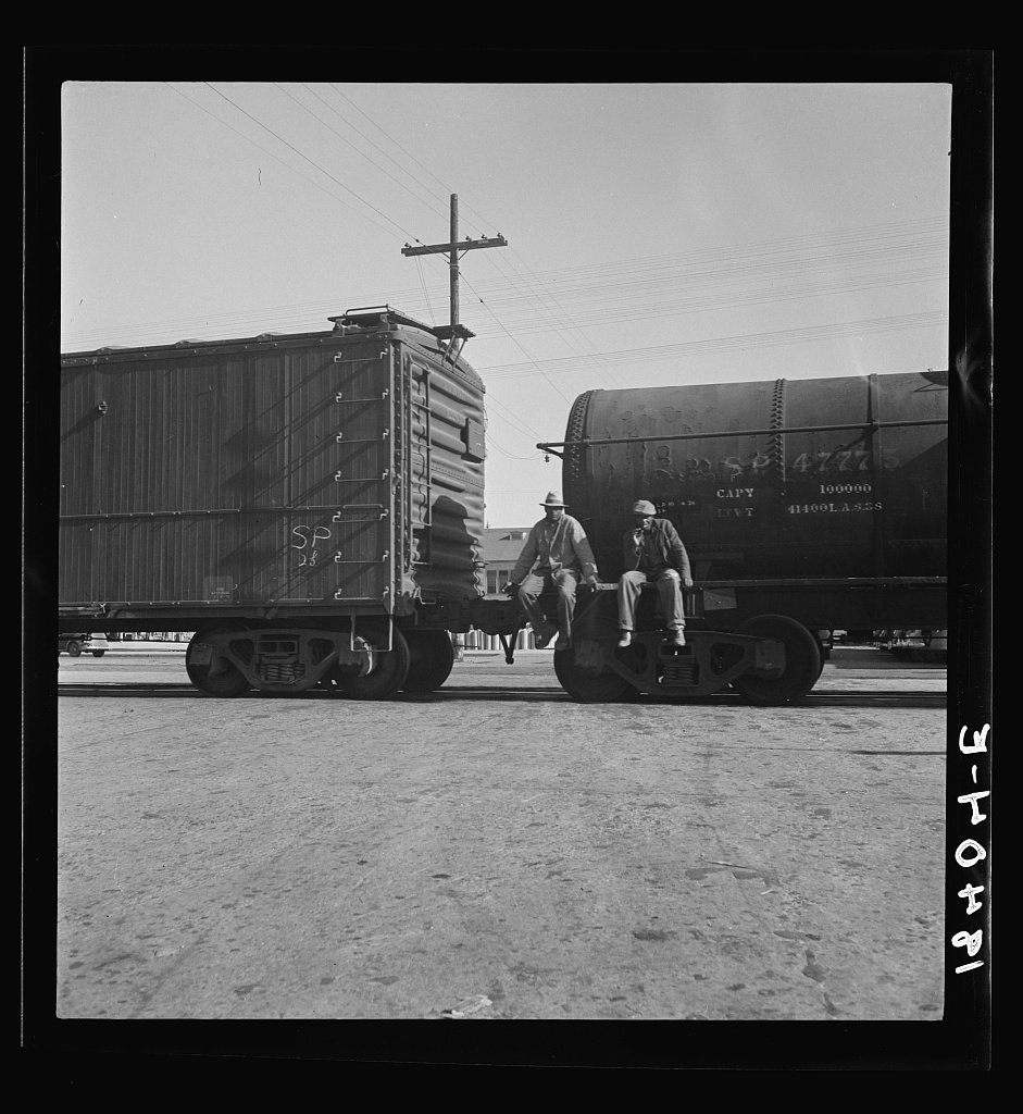 Black itinerants on oil tank cars passing through Kingsbury, California
