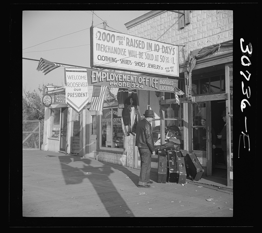 Luggage with transient in front. Grand Forks, North Dakota
